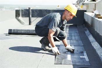 How Twin Cities Weather Impacts Commercial Roof Replacement Timing