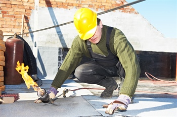 How Preventive Roof Maintenance Reduces Energy Costs in Commercial Buildings